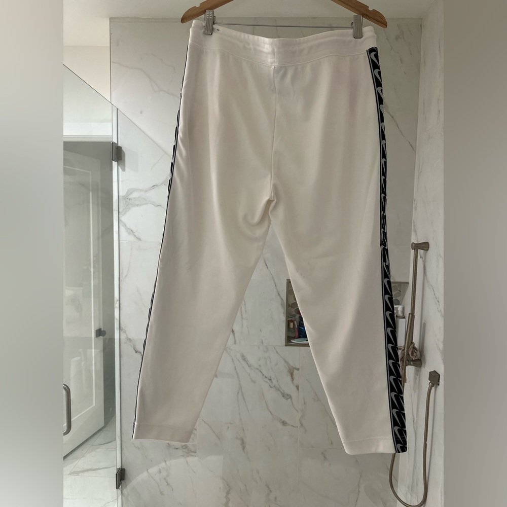 nike jogger logo tape pink